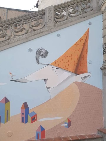 "Balanced on the wall" mural ("In equilibrio sul muro")